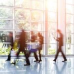 Group of business people rushing in the lobby